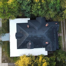 Historic-Roof-Replacement-Specialists-Inside-Ark-Roofings-Work-at-The-Inn-on-Anderson 1